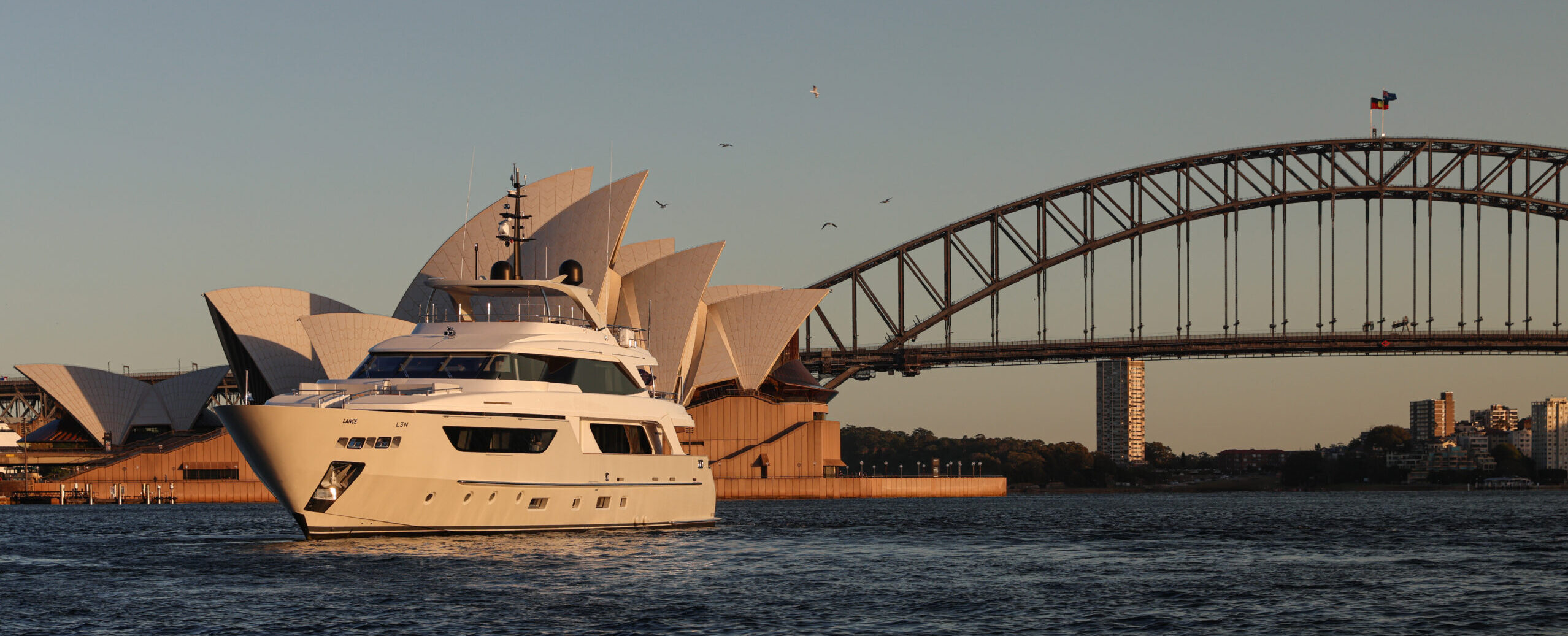 superyacht in sydney harbour yacht dusk charter